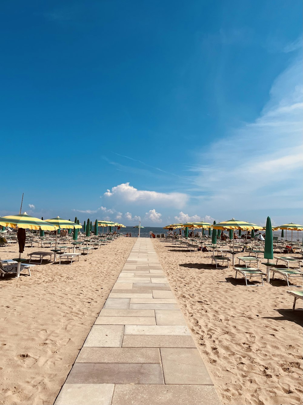 a beach with umbrellas