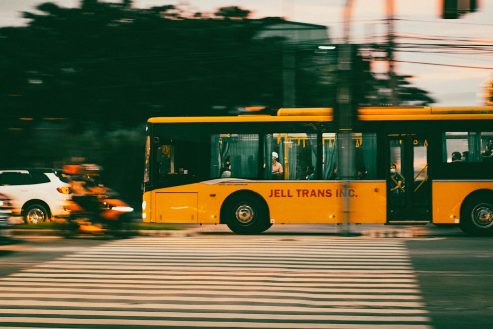 a yellow bus on the street