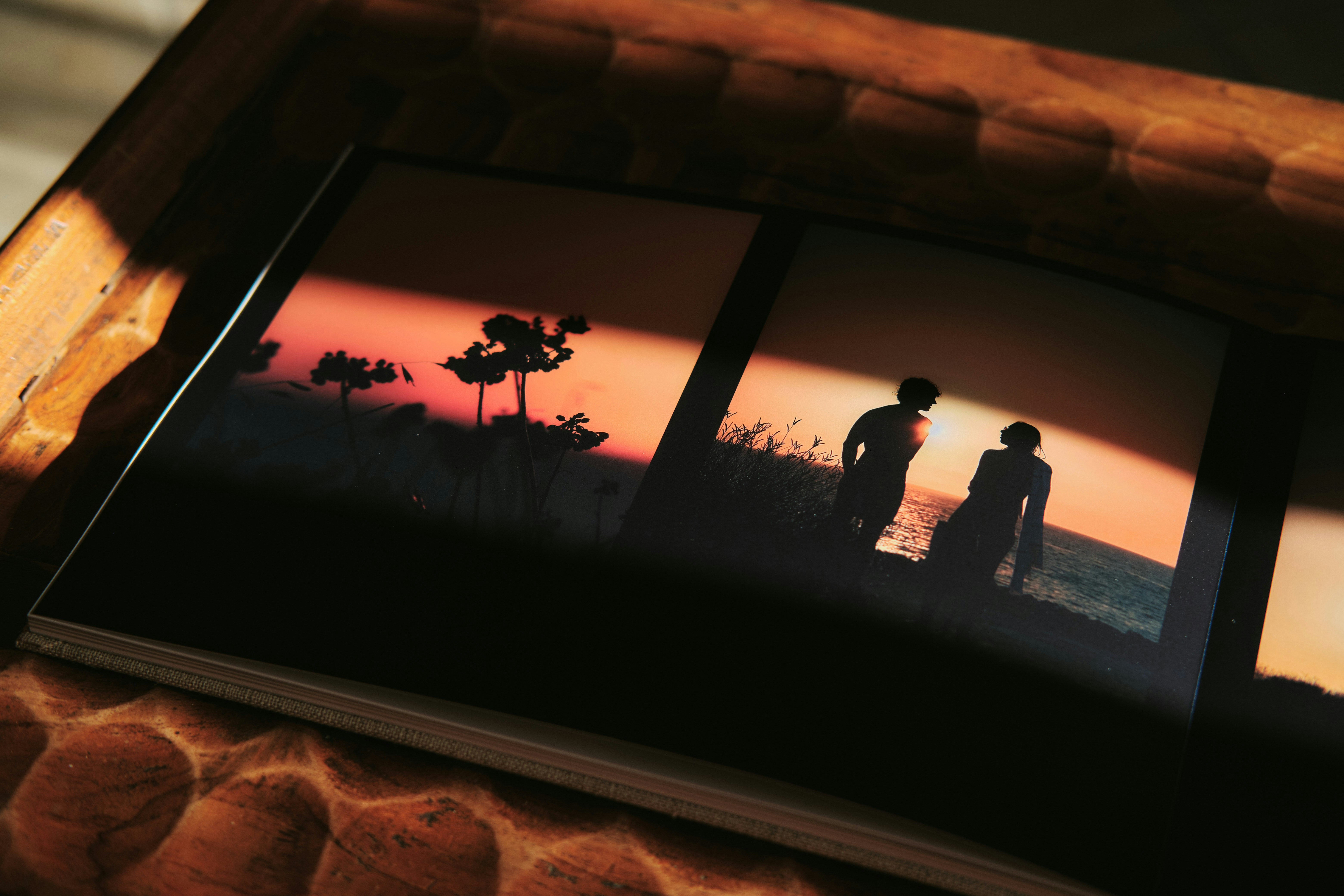 a mirror showing a couple of people