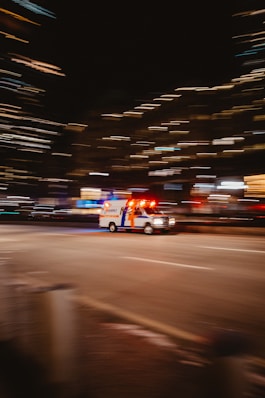 a police car driving down the street