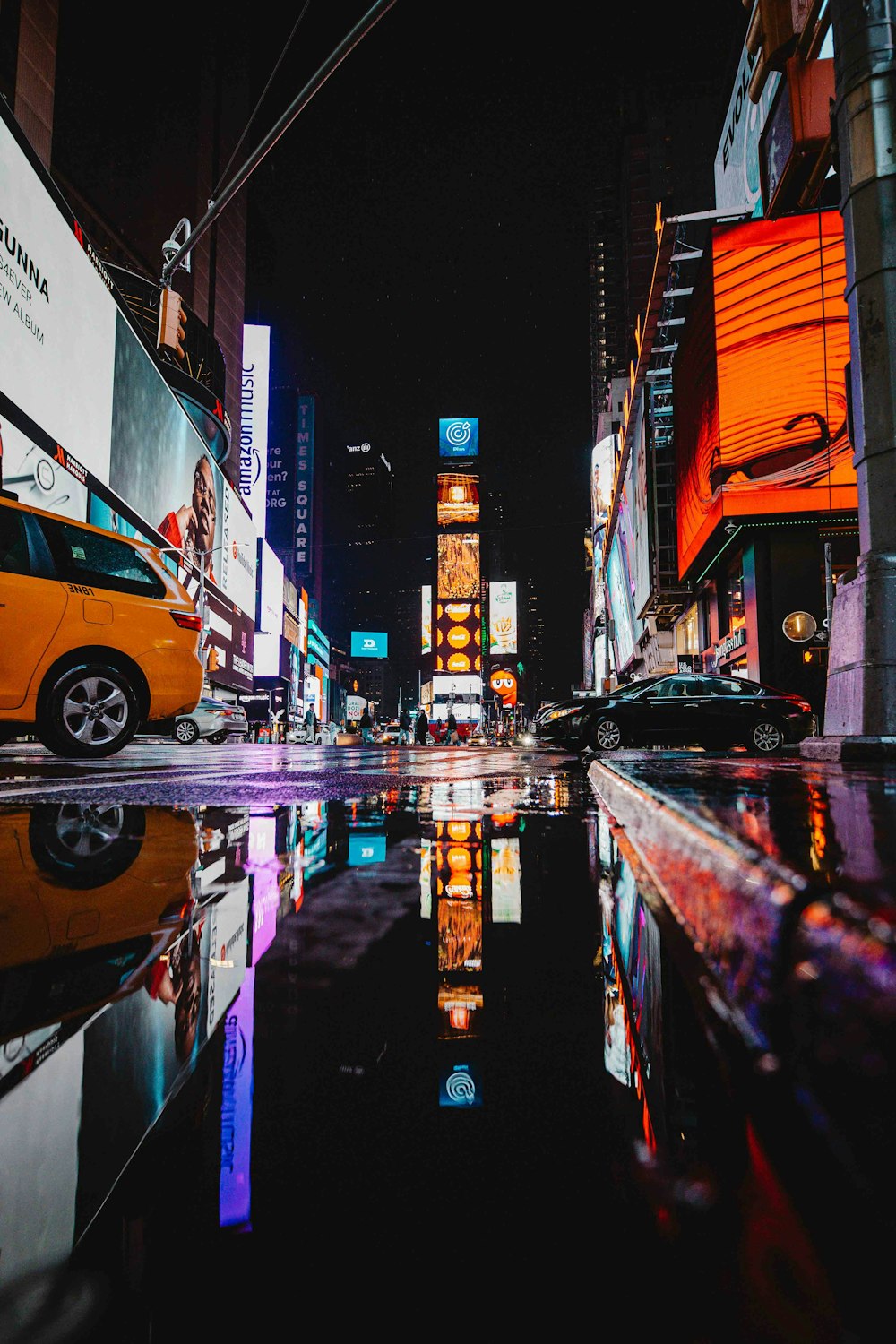 a busy city street at night