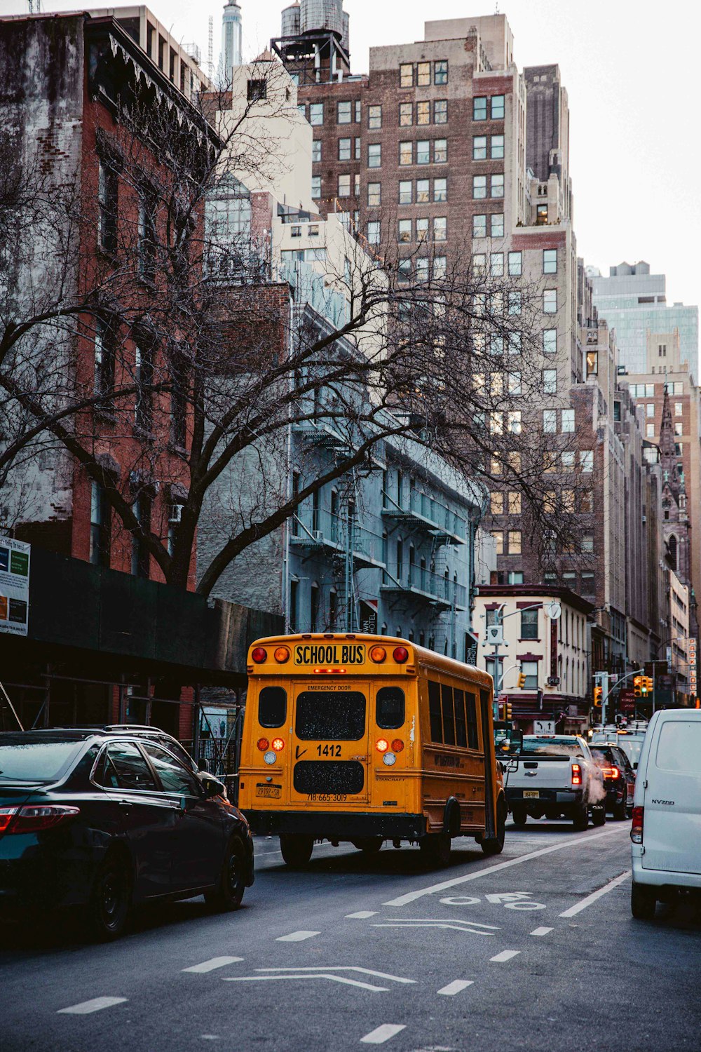 a yellow bus on the street