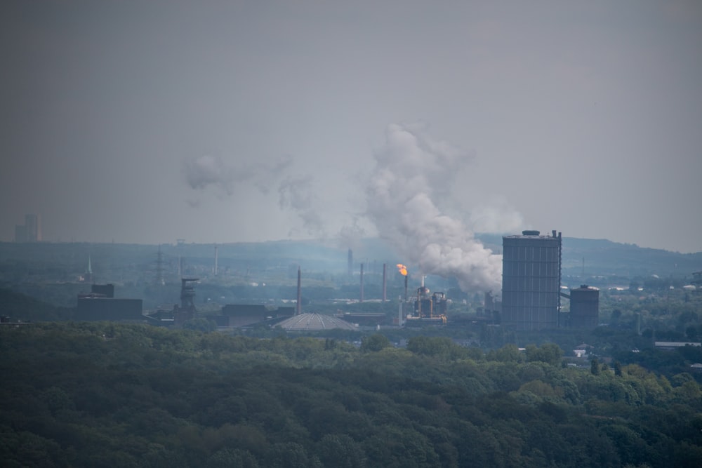 a city with smoke coming out of it