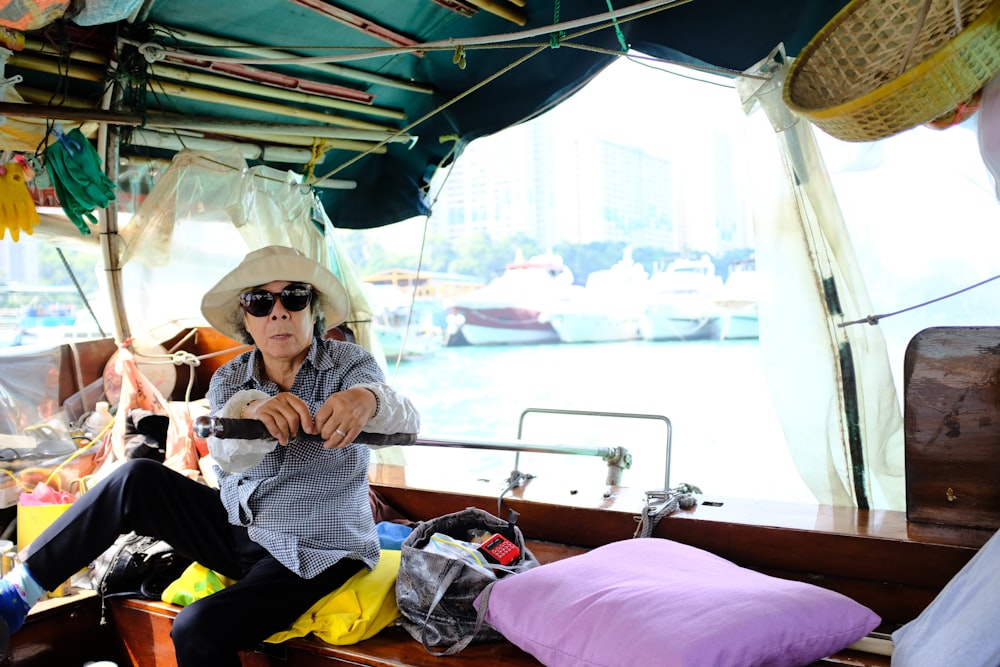 a man sitting on a boat