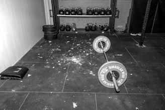 a room with a few antique weights