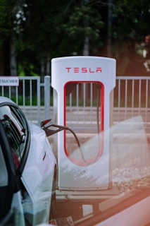 a red and white sign on a car