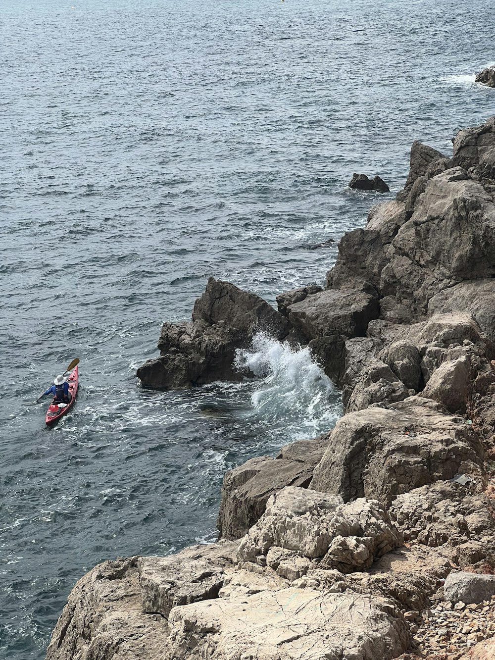 a person in a kayak in the water