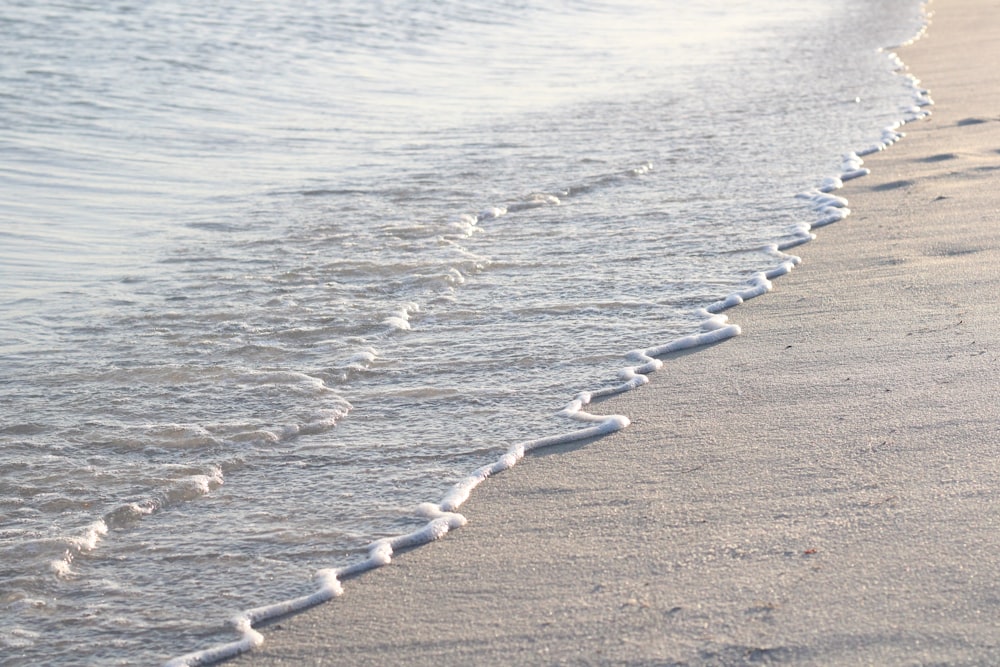 a beach with waves