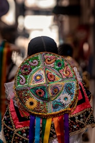 a person wearing a colorful hat