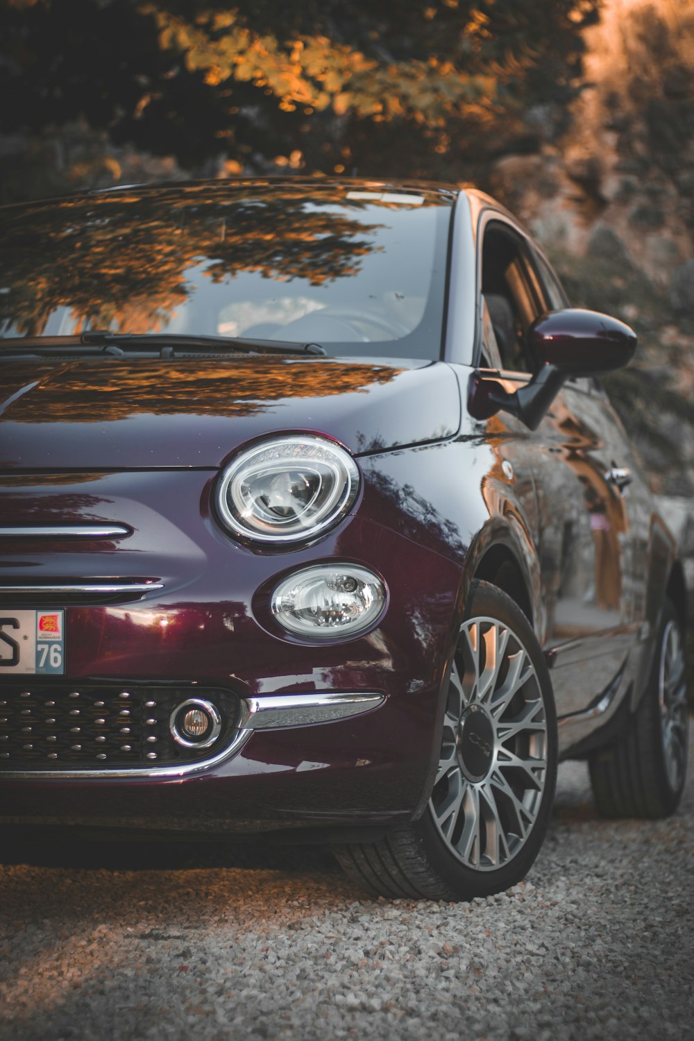 a car parked on gravel