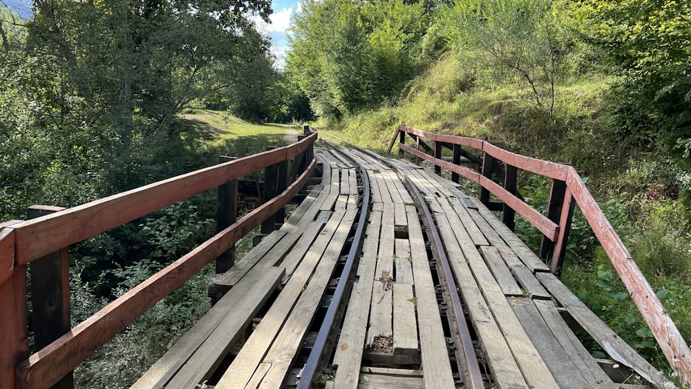 a wooden bridge over a river