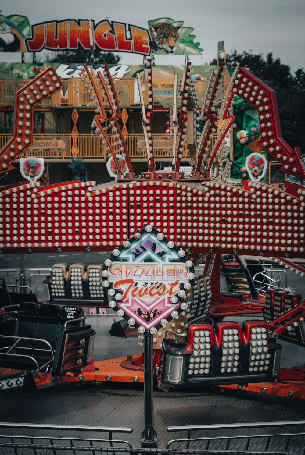 a roller coaster with a crowd of people on it