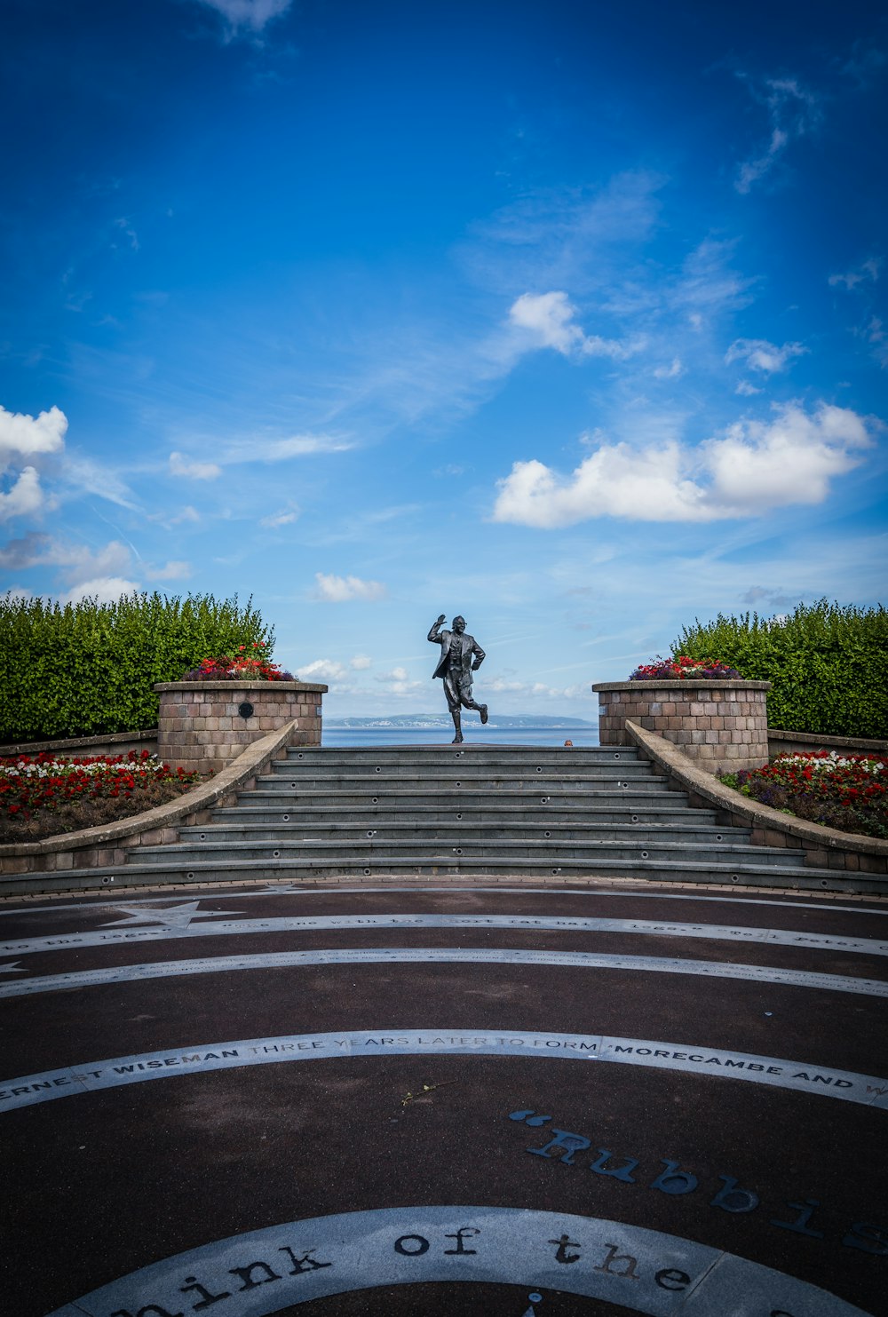 a statue on a set of stairs