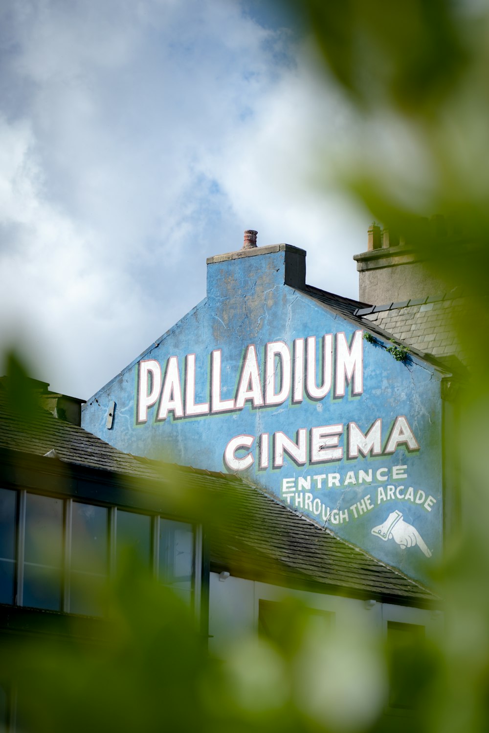 a blue sign on a building