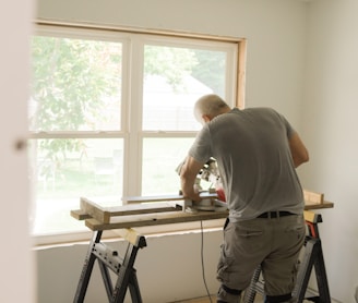 a man shooting a gun