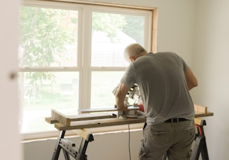 a man shooting a gun