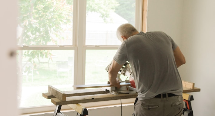 a man shooting a gun