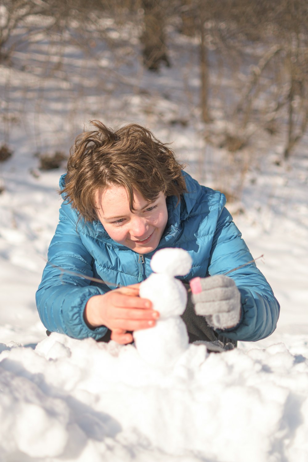 a person sitting on the snow