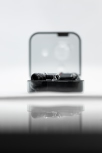 A sleek gadget displayed with a modern background.