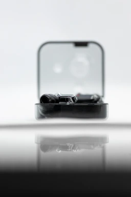 Futuristic gadgets showcased with black minimalistic design and glowing blue Korean-inspired details.