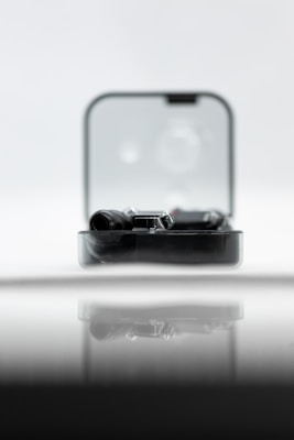 A sleek gadget displayed with a modern background.