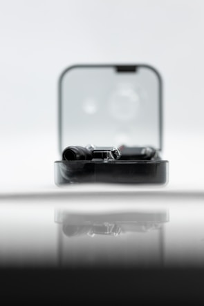 Dynamic shot of a sleek product ad showcasing a modern gadget against a clean, minimalist backdrop.