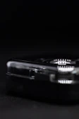 Close-up of a custom acrylic support with polished edges and a glossy finish.