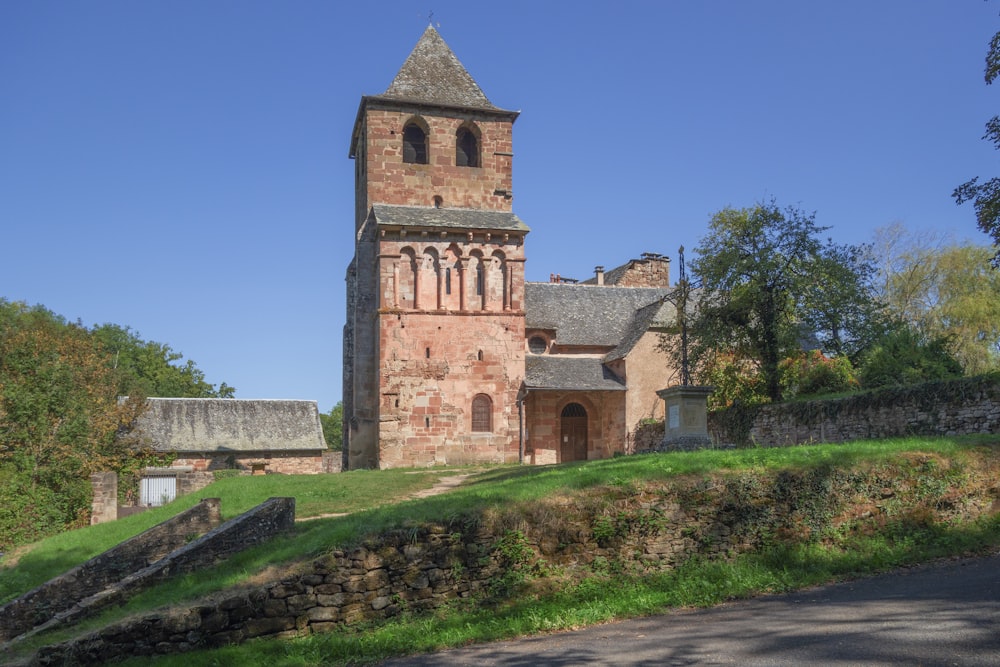 a stone building with a tower