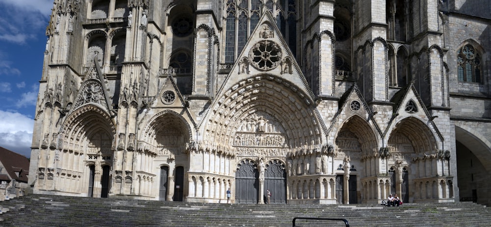 a large stone building with many arches