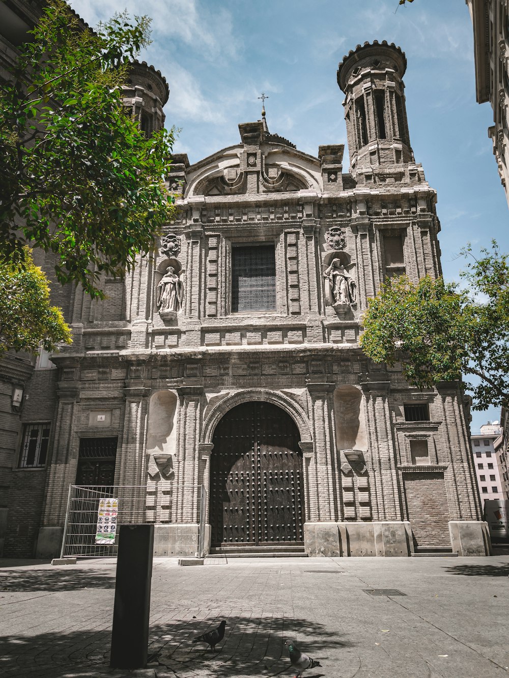 a stone building with a large door