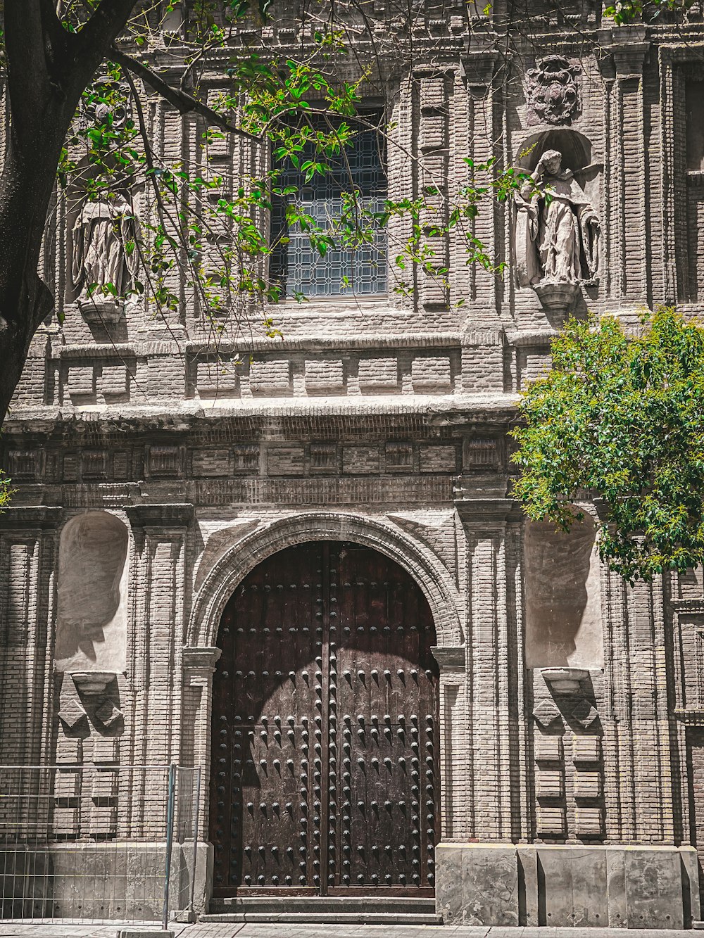 a brick building with a large door