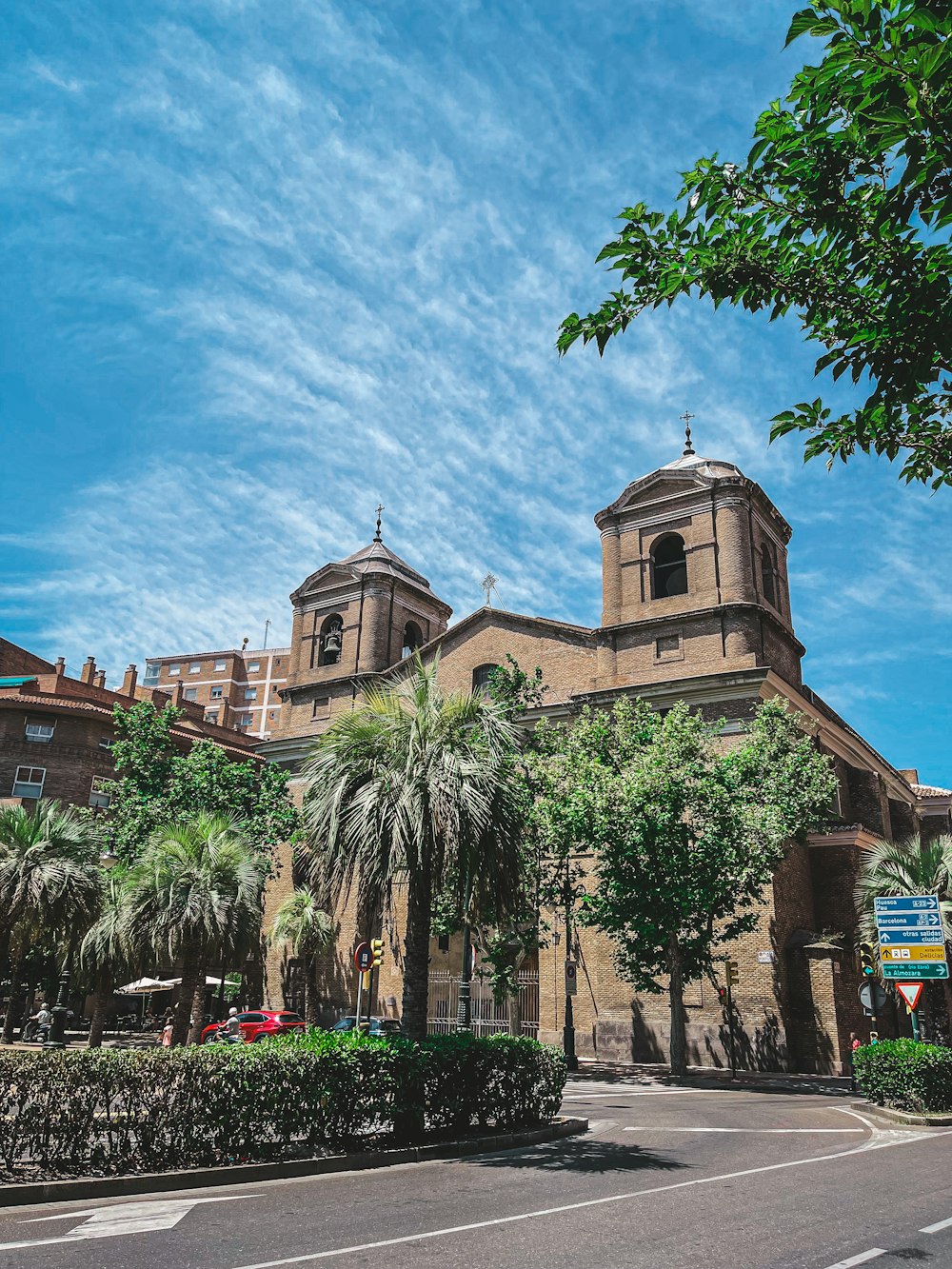 a large building with trees in front of it