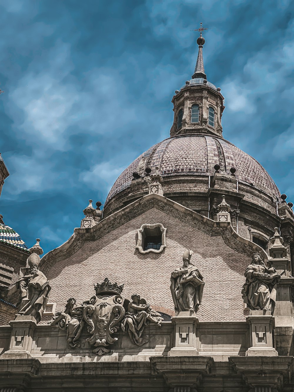 a building with statues in front of it