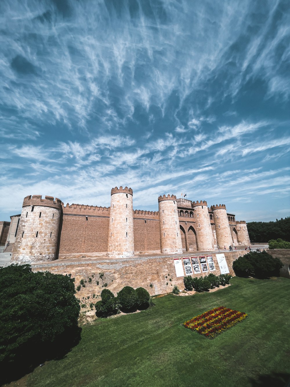 a large stone building with towers