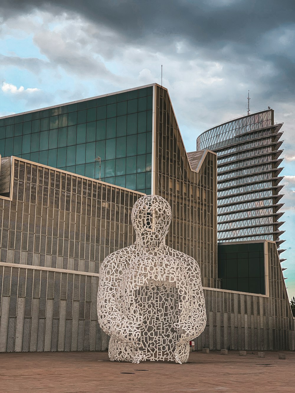 a statue in front of a building