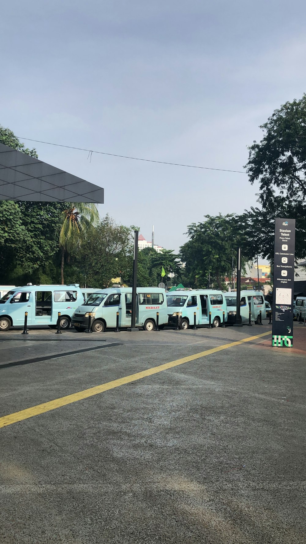 a group of vehicles parked on the side of a road