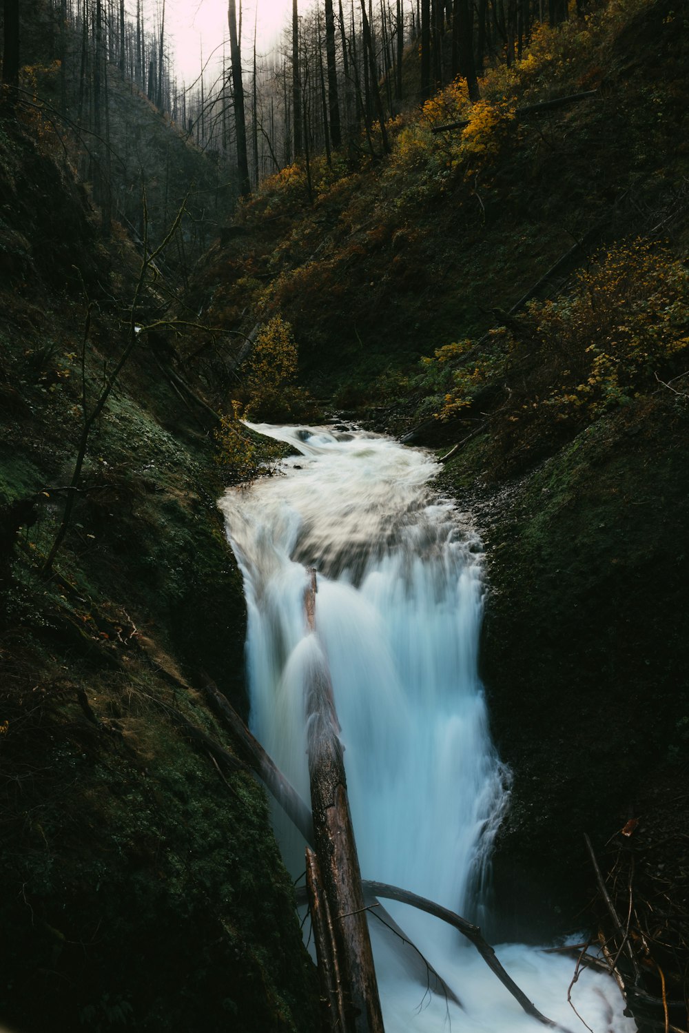 a river with a waterfall