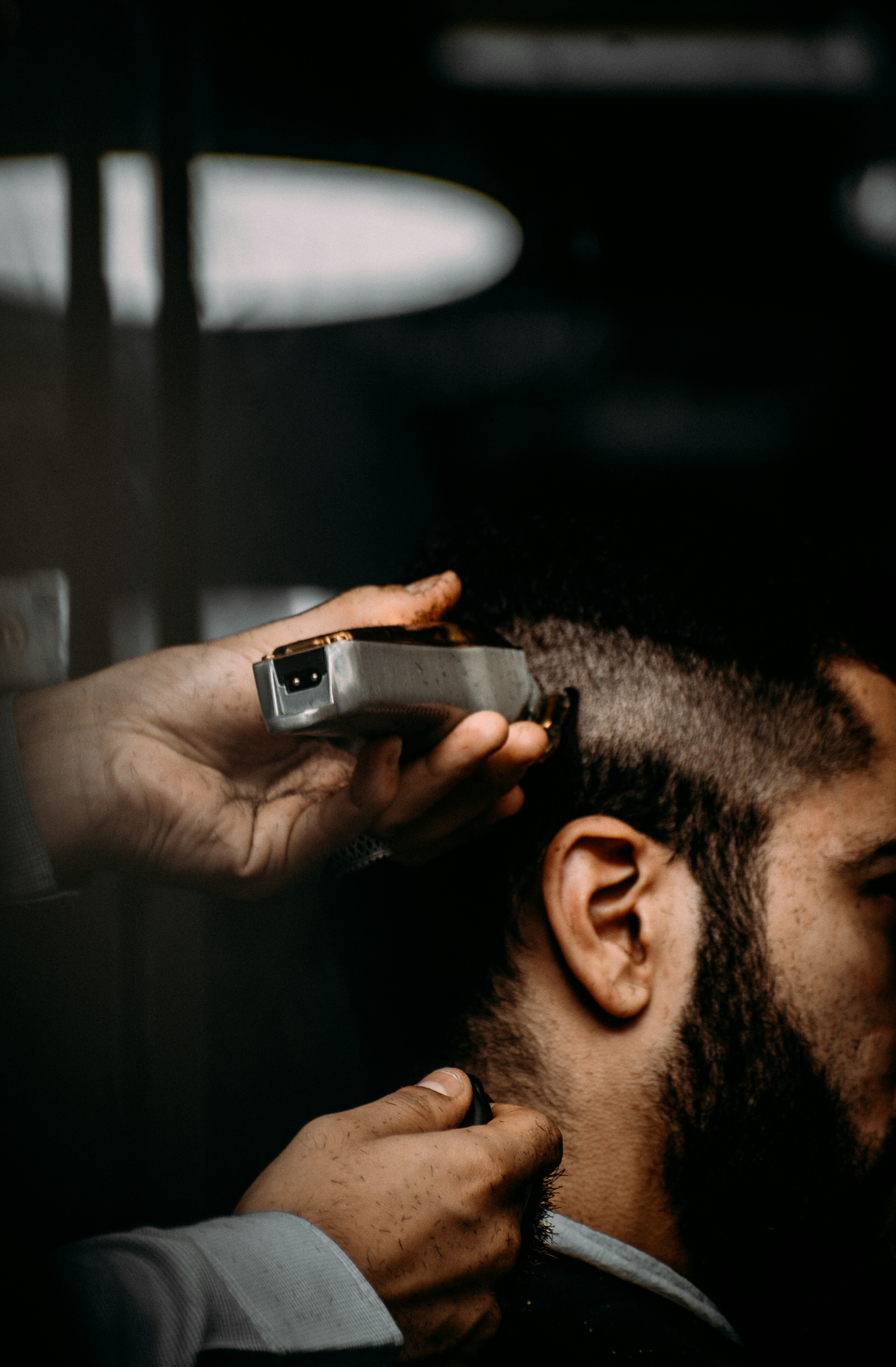 a man getting his haircut