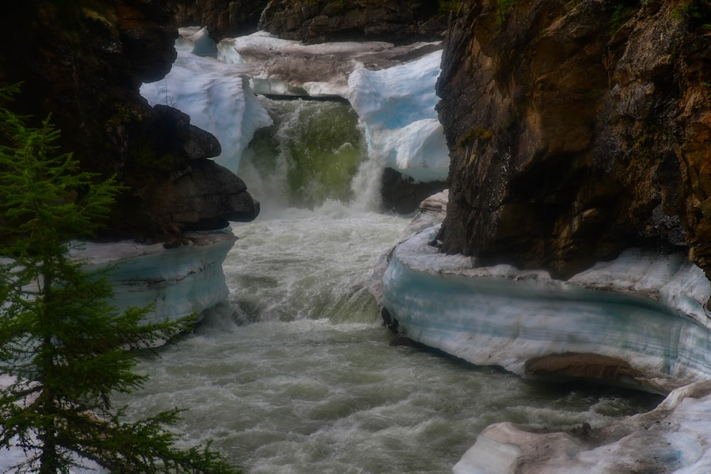 a river flowing between large rocks