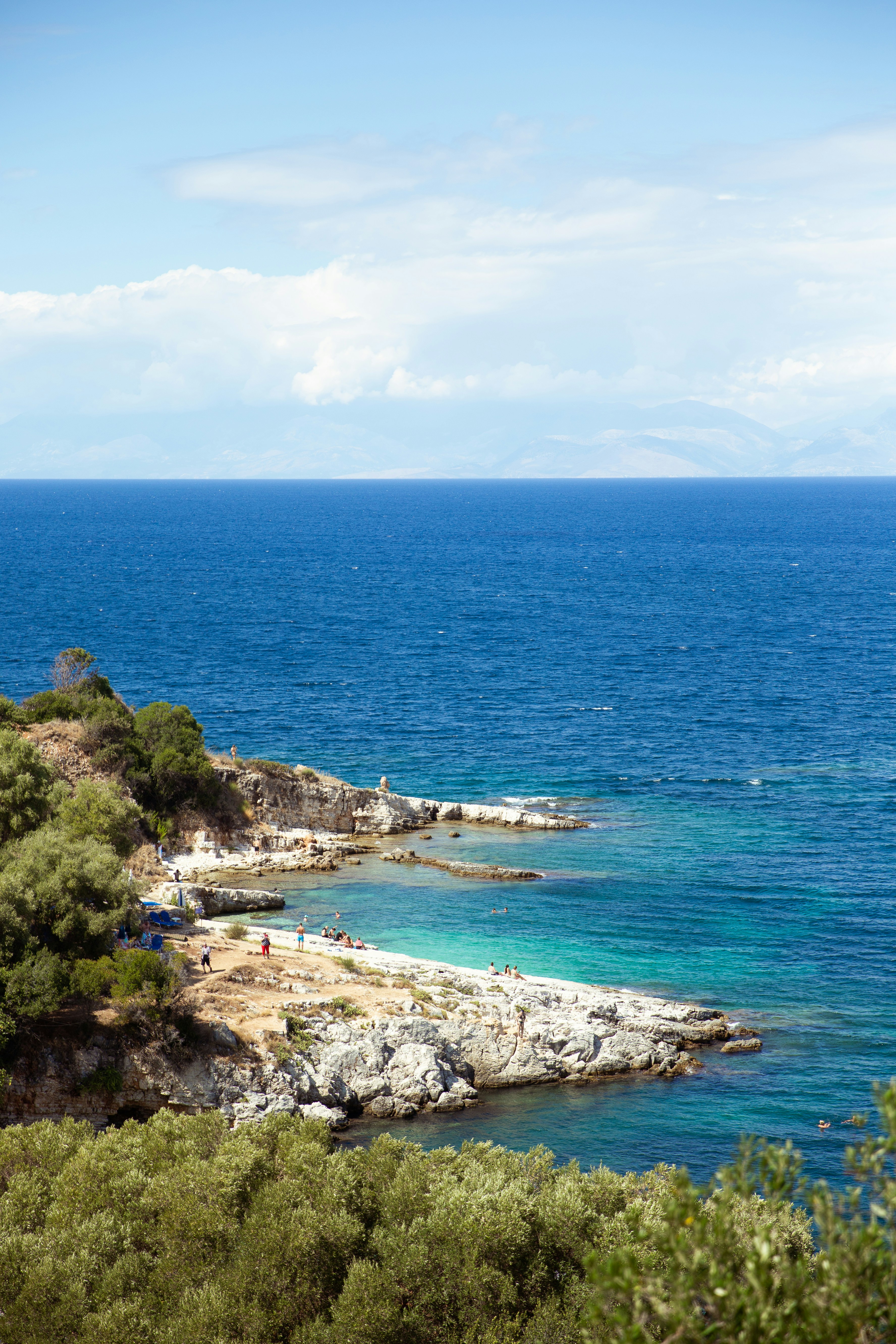 a beach with people on it