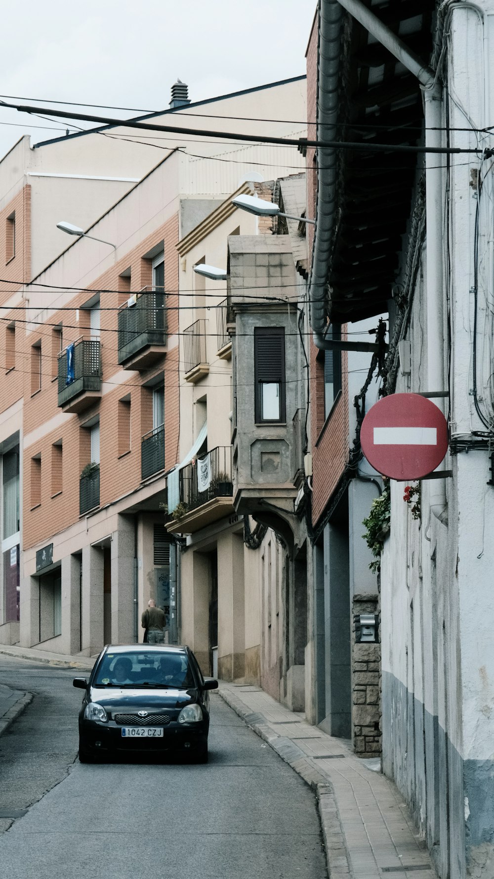 a car parked on the side of a street