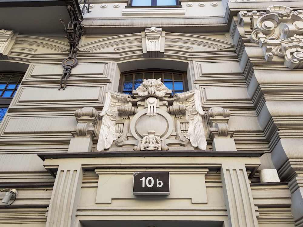 a building with a statue on the front