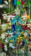 An artistic display of ornaments on a shelf.