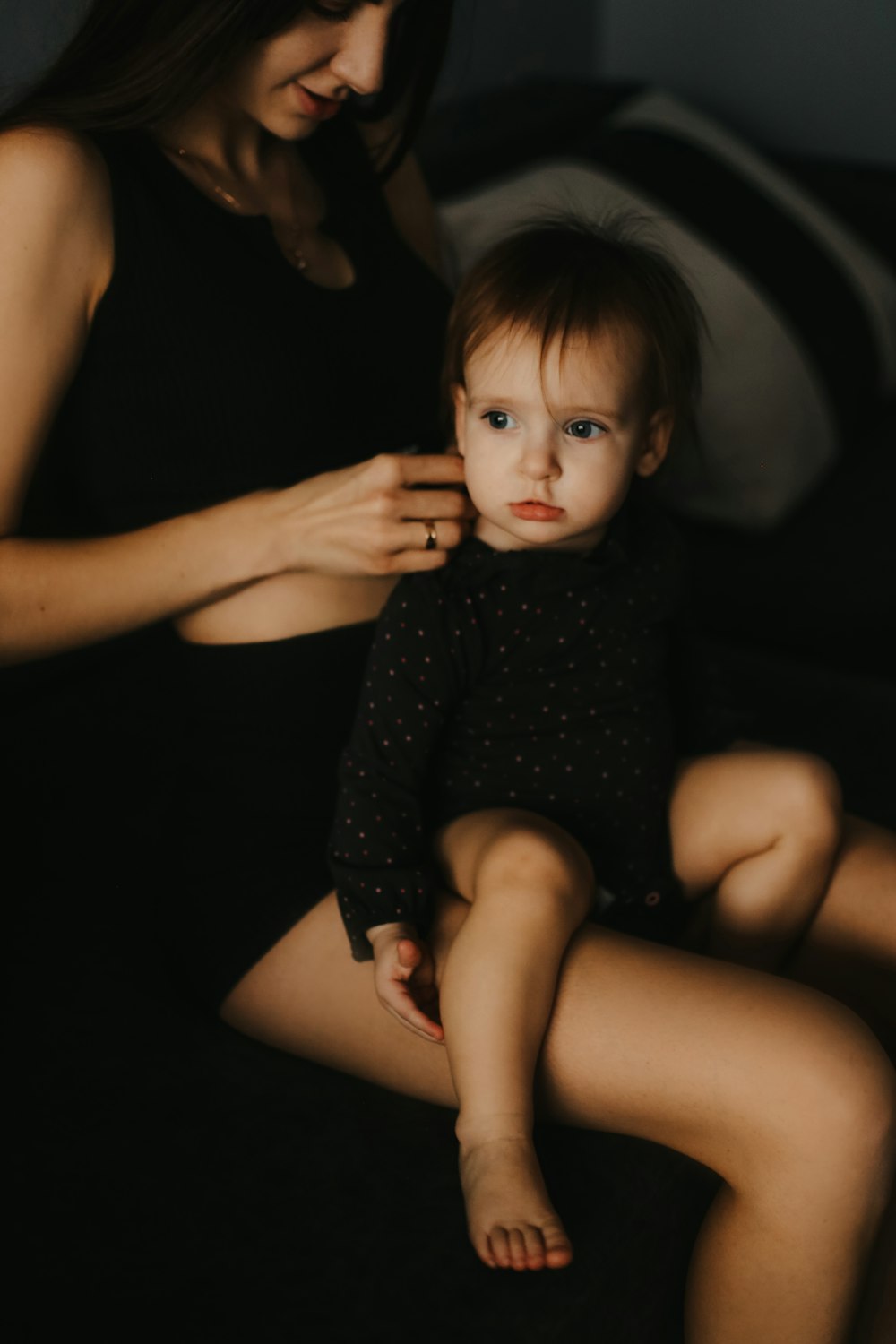 a woman holding a baby