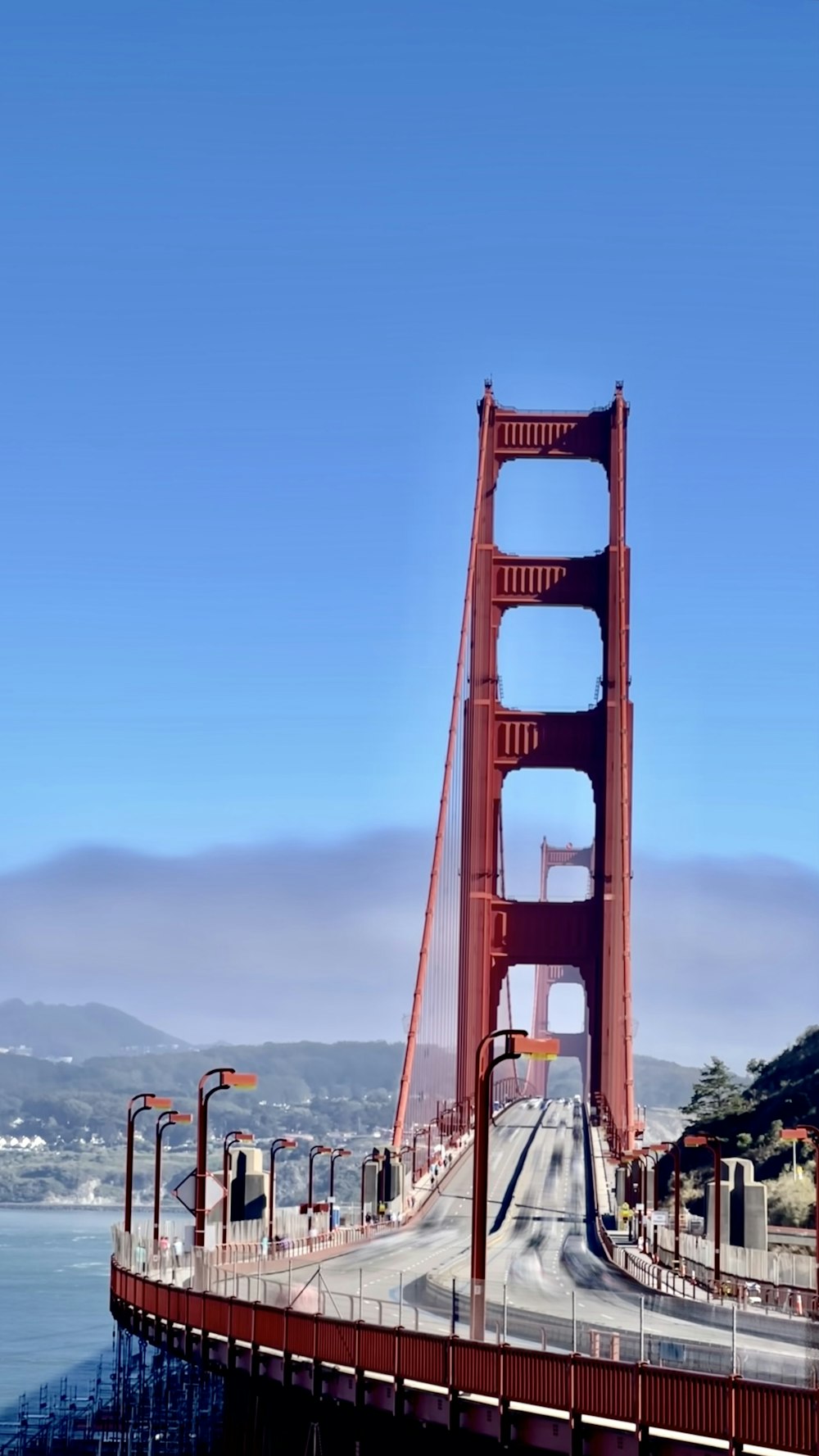 a red bridge over water