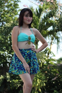 A vibrant summer skirt displayed on a sunny beach.