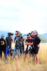 a group of people with cameras