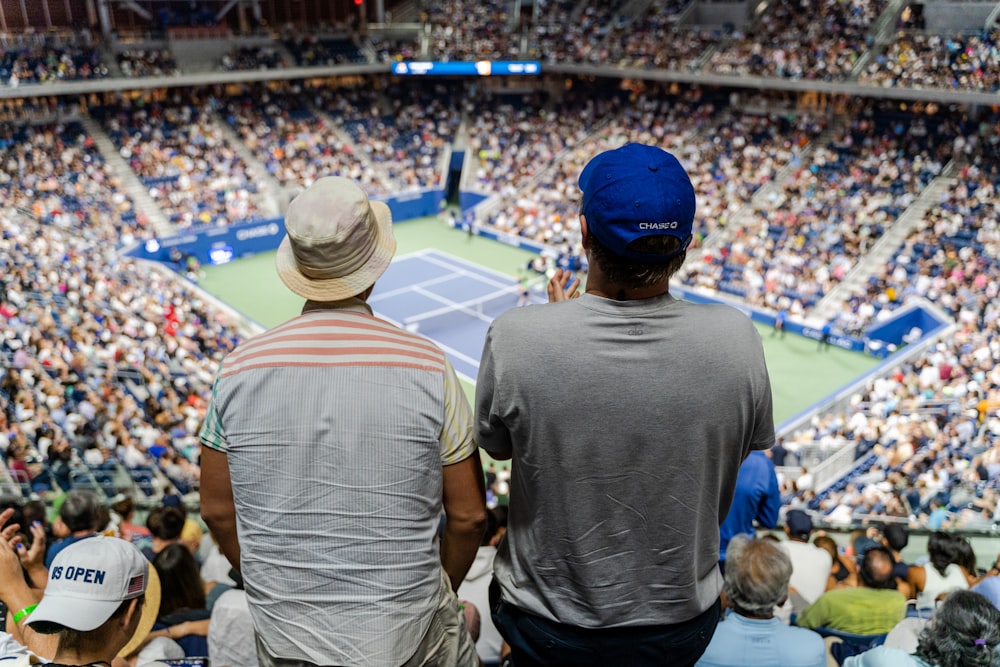 a couple of men in a stadium