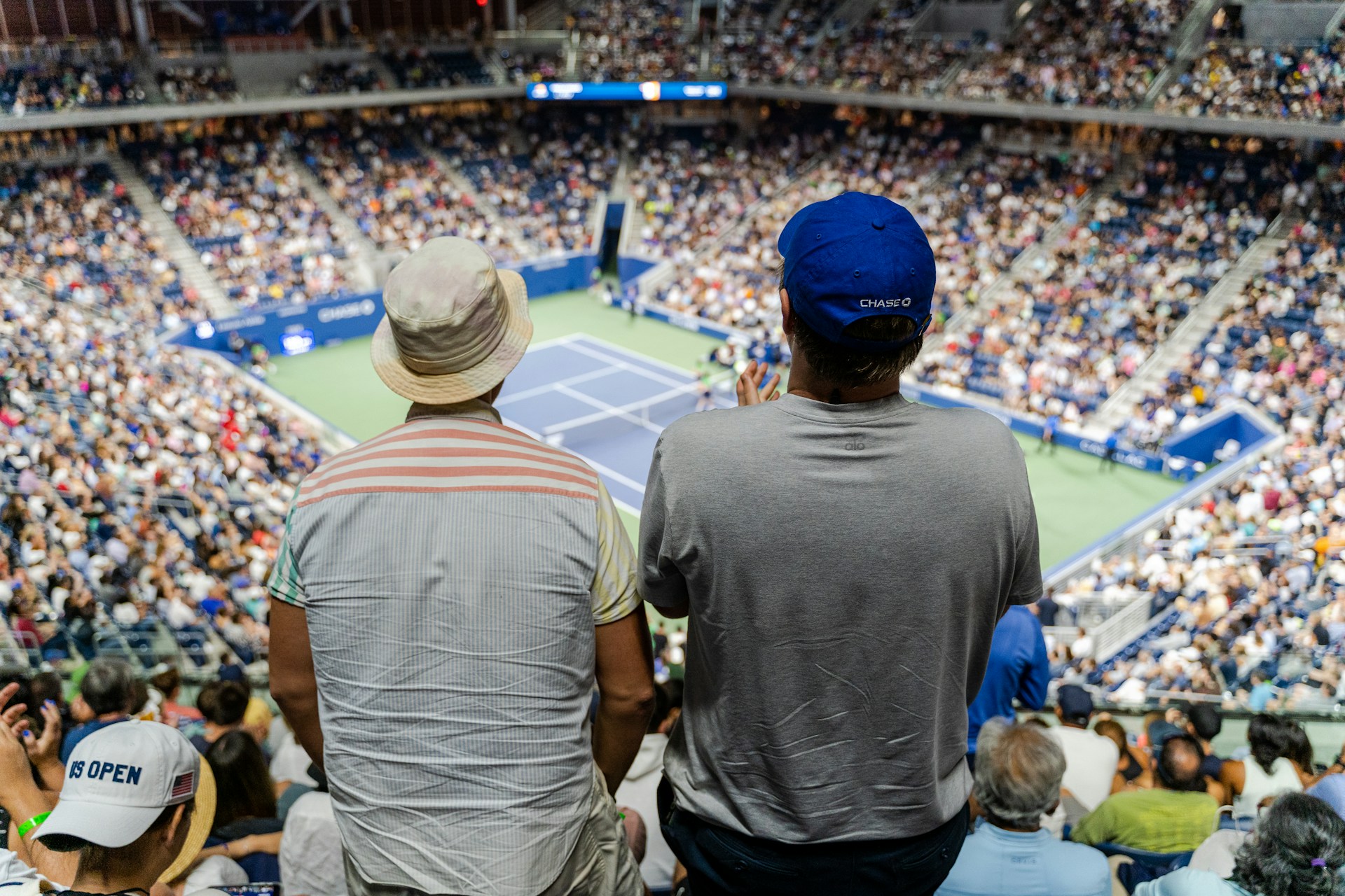 a couple of men in a stadium