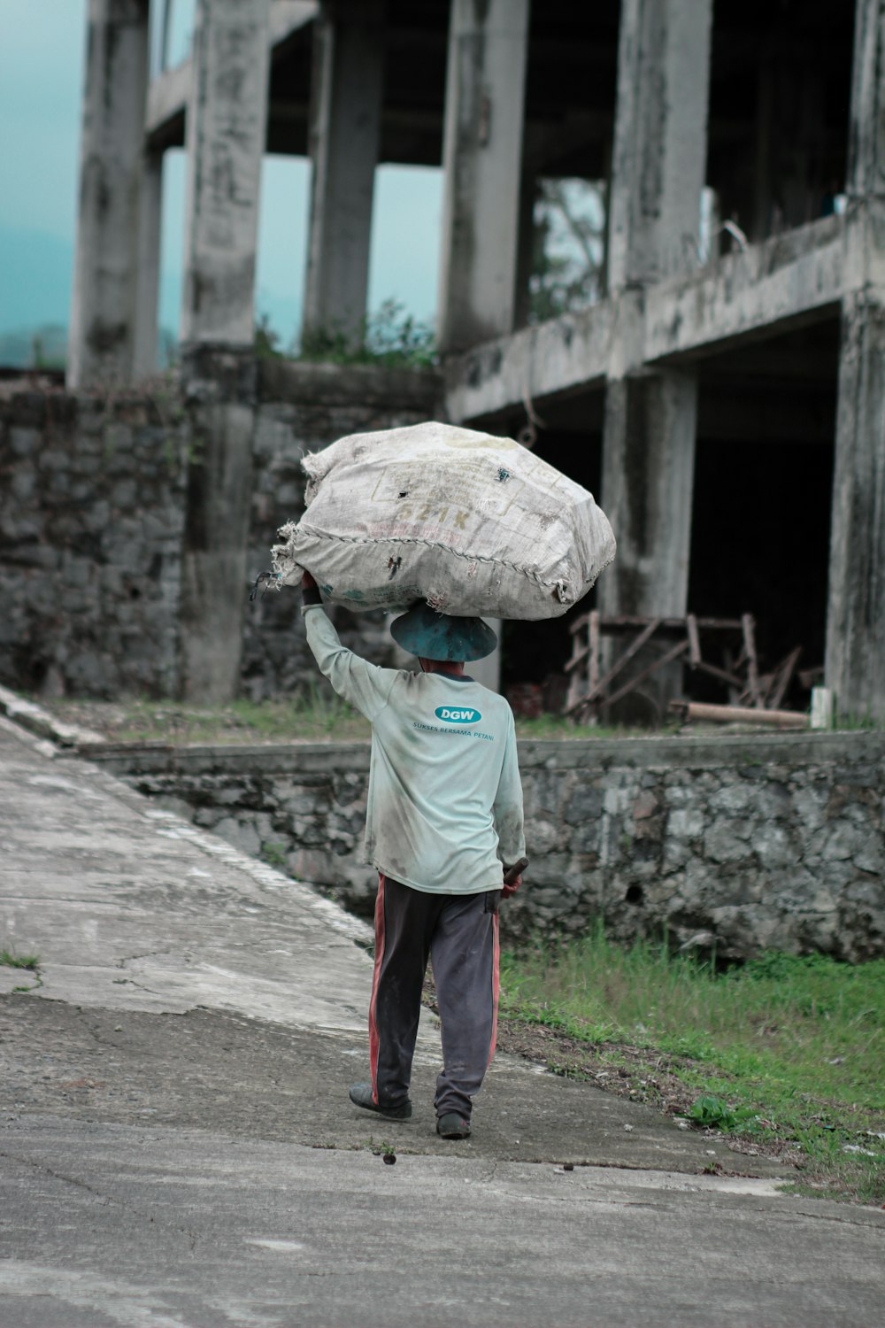 a person carrying a large load